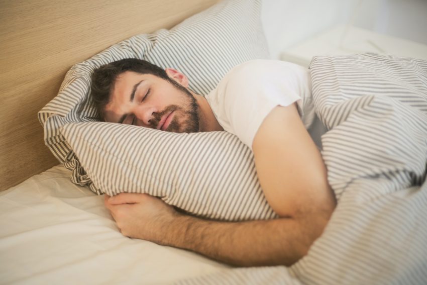 Man asleep - The Impact of Sleep Deprivation on Physical and Mental Health